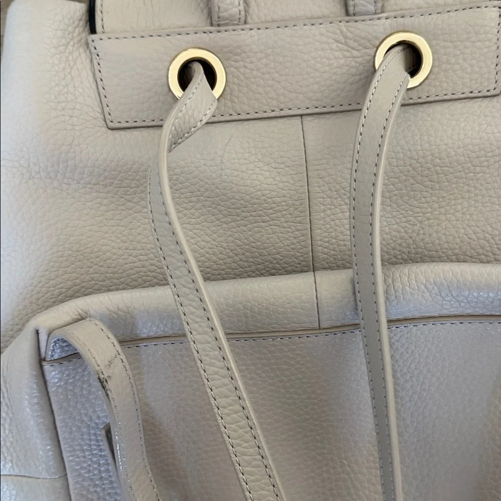 Kate Spade Chester Street Kacy Moussefrost with black accent and tassel backpack